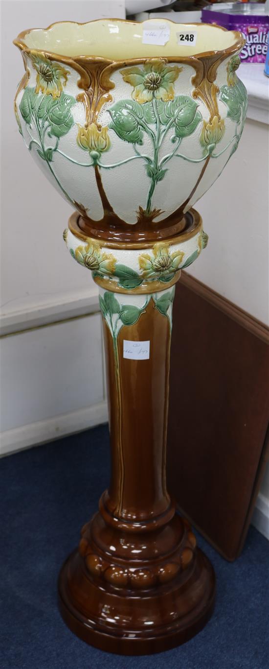 A Burmantofts jardiniere on stand